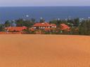 Fancy hotels beyond the dunes.